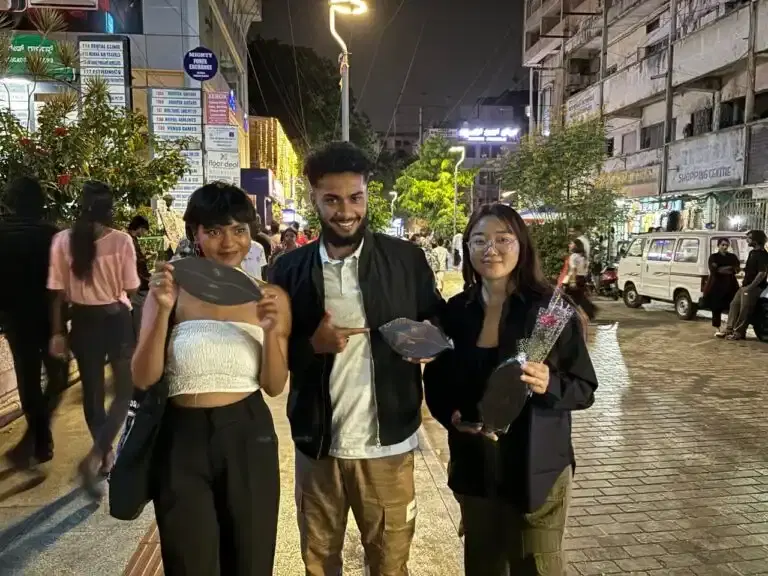 The DZIR team sharing chocolate at an evening event